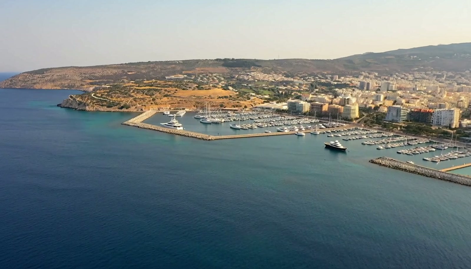 Aerial journey from Limassol marina through golf residences to Omodos village